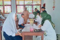 Foto: Cek Kesehatan Gratis (CKG) di SMP Negeri 1 Sulabesi Timur.