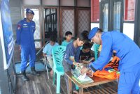 Dok: Polairud Marnit Halbar, Aipda Julkifli Humah, S.H., Melaksanakan Kegiatan Perpustakaan Terapung.