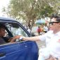 Dok: Ketum KONI Kepulauan Sula, Kamarudin Mahdi, S.STP, Bagikan Masker Gratis Kepada Masyarakat.